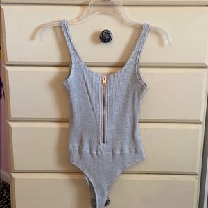 Zip up light grey bodysuit